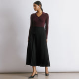 Black Pleated Midi Skirt by Albaray