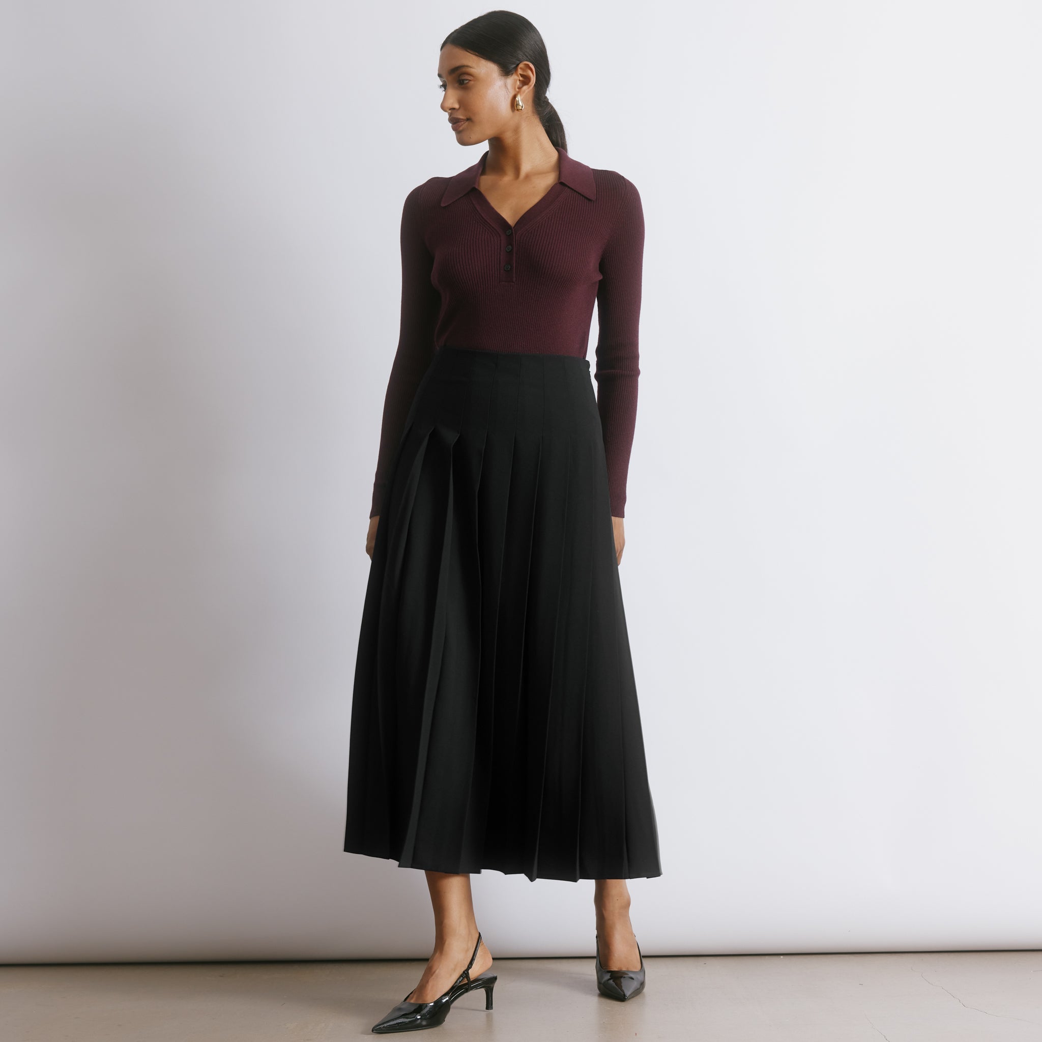 Black Pleated Midi Skirt by Albaray