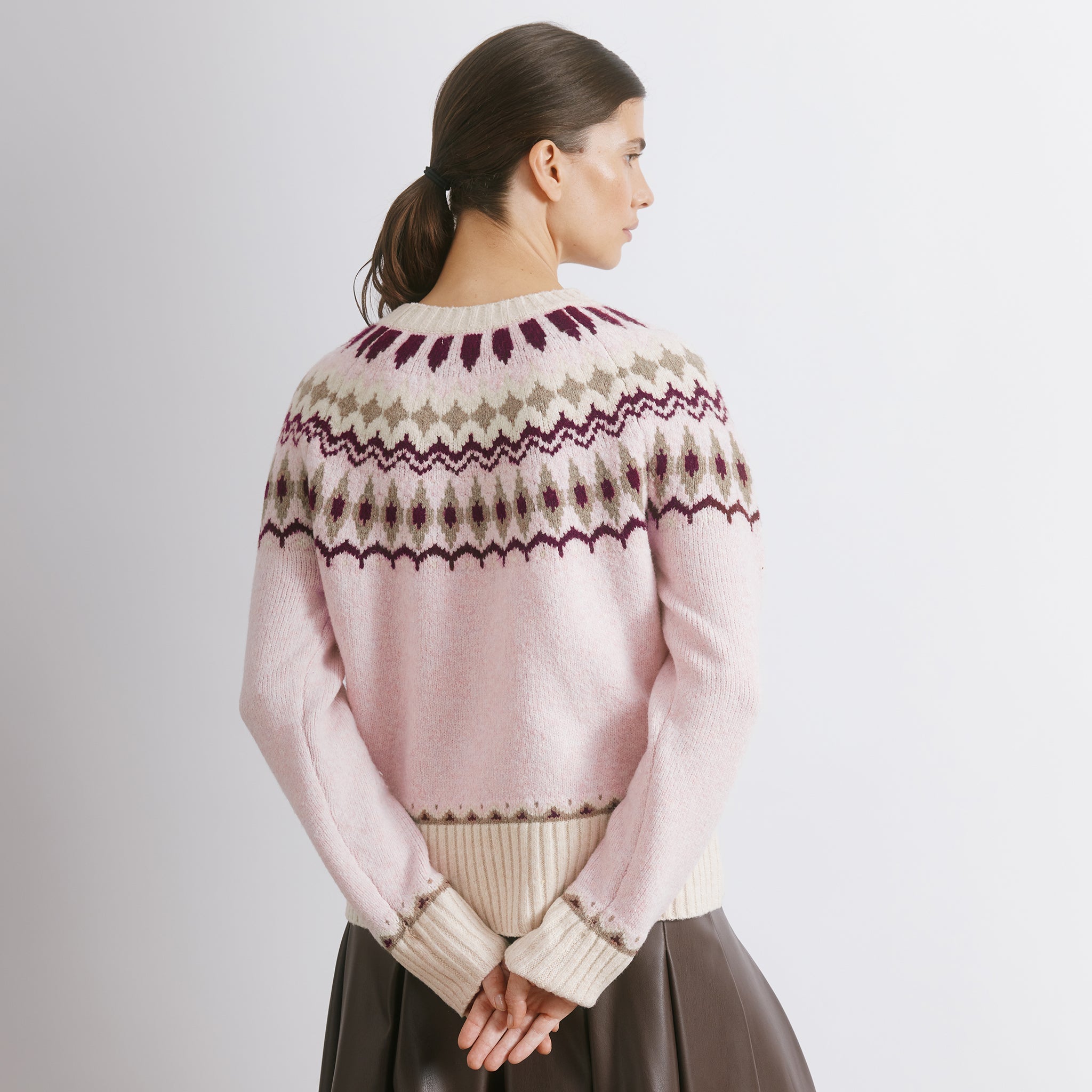 Pink jumper in fair isle knit pattern with cosy wool blend design  