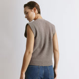 Argyle sweater vest in classic knit design with button front detailing  