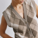 Knitted argyle vest styled as a sleeveless tank top in soft wool blend  