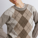 Wool argyle pullover featuring patterned knit details in timeless style  