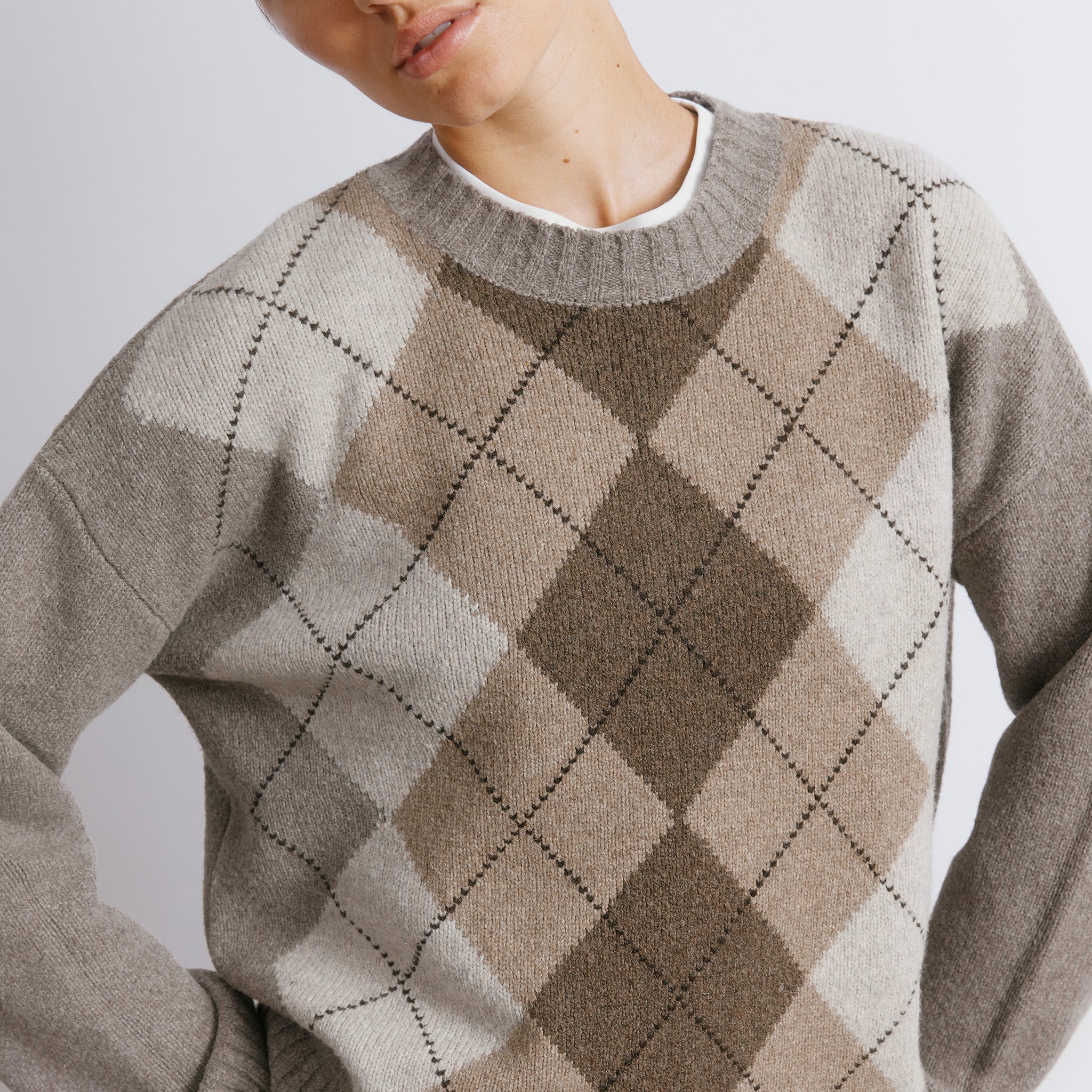 Wool argyle pullover featuring patterned knit details in timeless style  