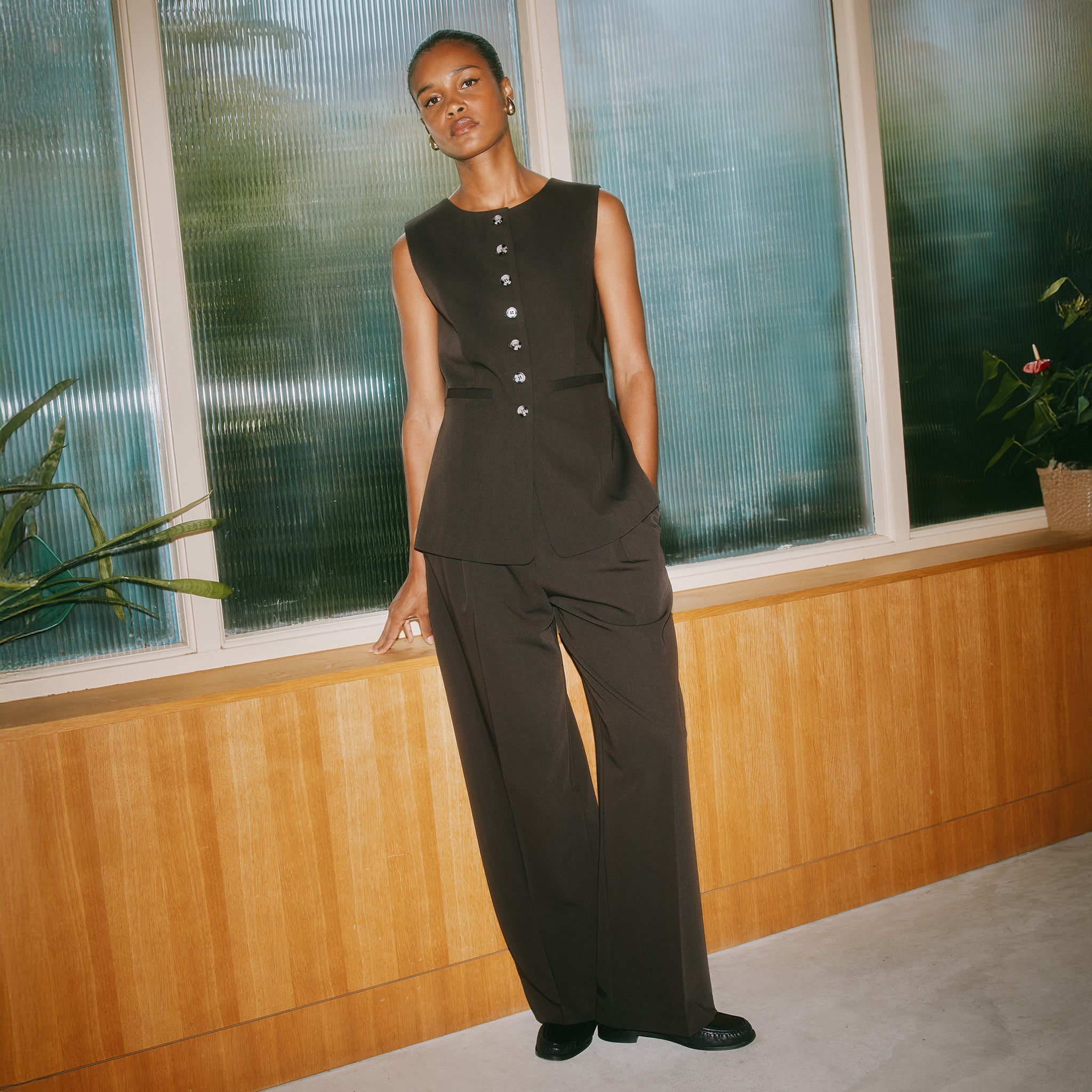 Side view of the longline sleeveless tailored jacket, chocolate brown co-ord vest, sustainable organic cotton waistcoat.
