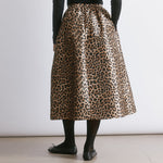 Animal print skirt crafted from structured taffeta with a voluminous full silhouette and midi length.  