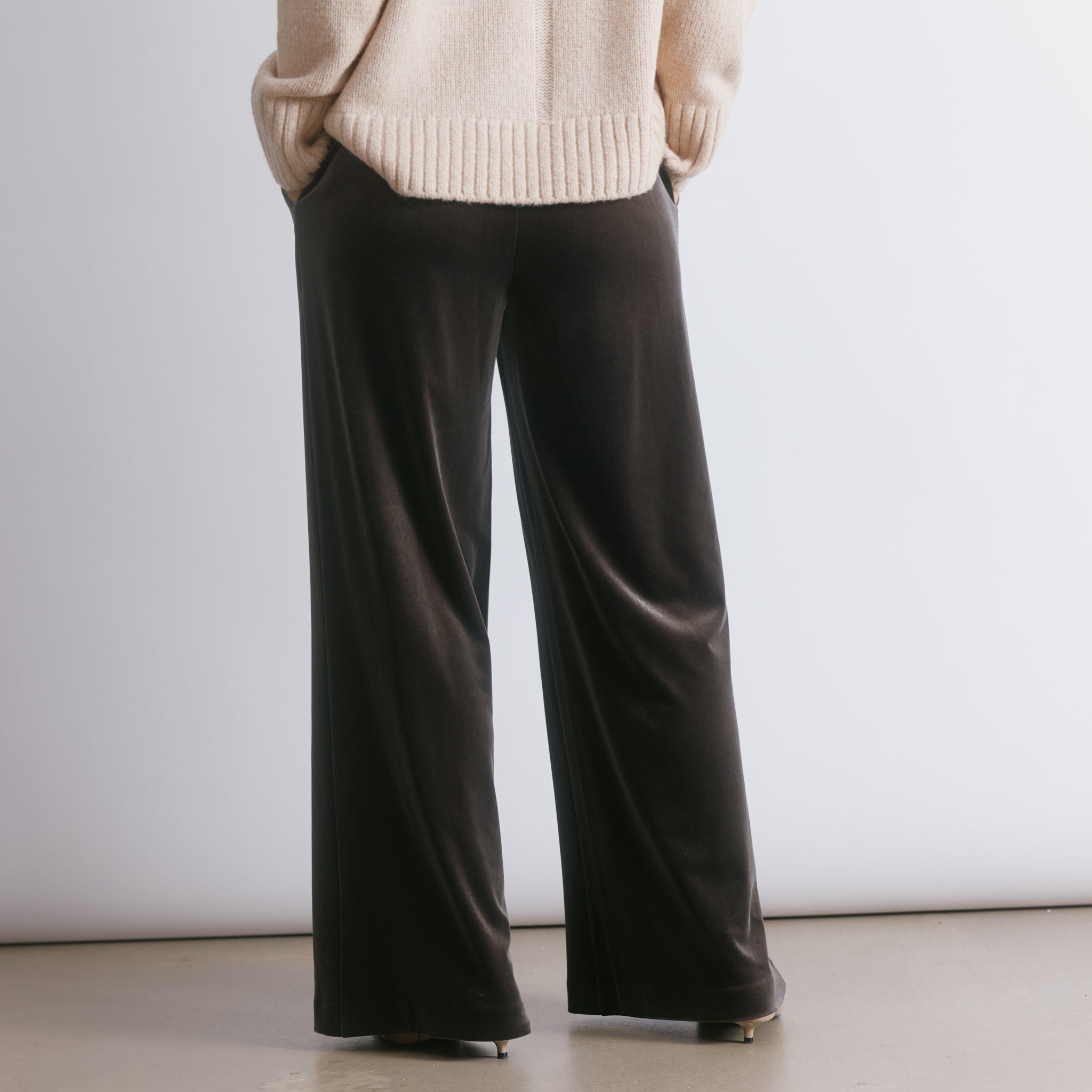 Mole velvet trousers crafted from soft luxury velvet, designed with a relaxed tailored fit and elegant wide leg.  