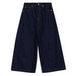 Side view of relaxed fit dark indigo wide-leg culottes made from sustainable, ethically produced organic cotton denim, perfect for a casual and eco-friendly wardrobe.