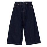 Side view of relaxed fit dark indigo wide-leg culottes made from sustainable, ethically produced organic cotton denim, perfect for a casual and eco-friendly wardrobe.