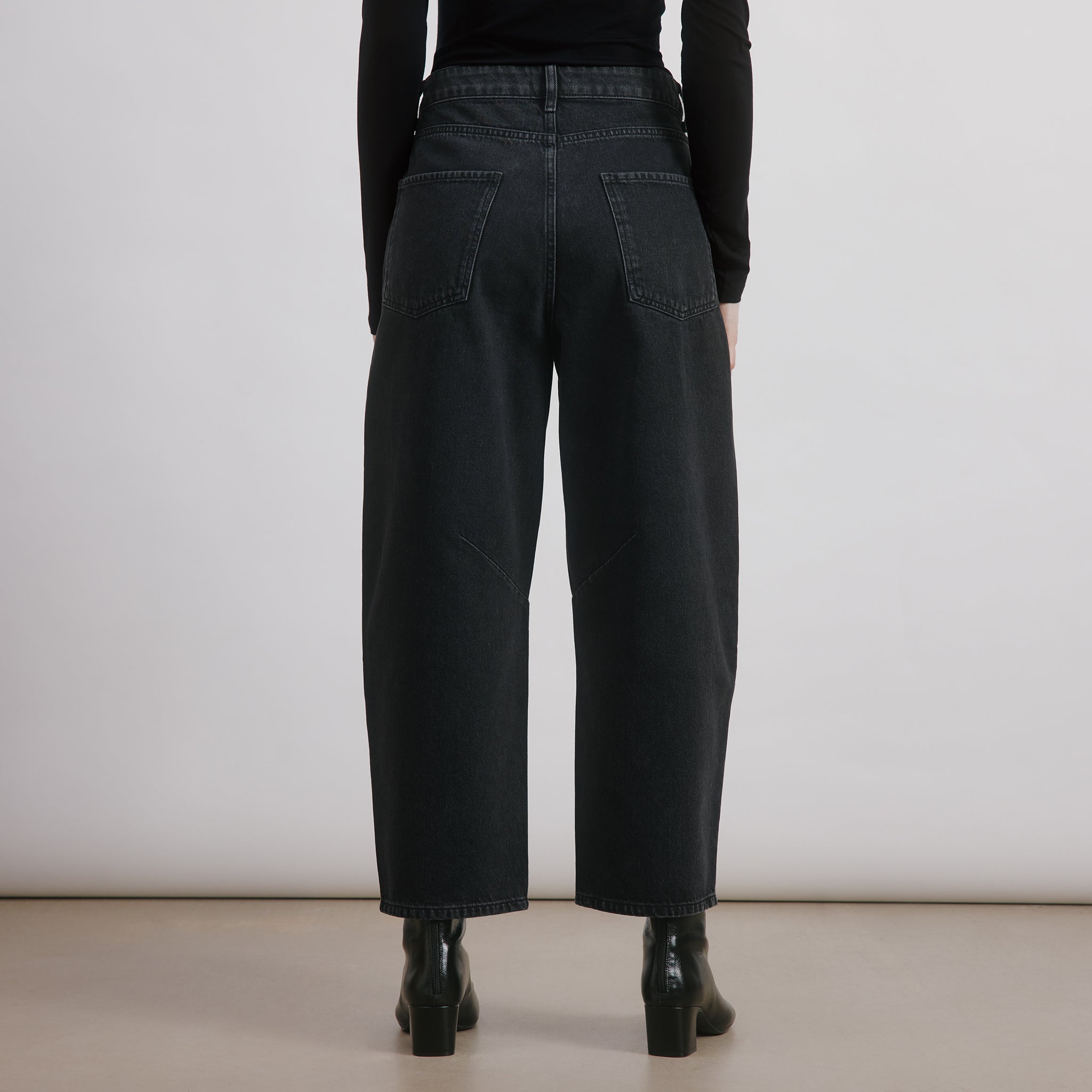 Black barrel leg jeans, mid-rise relaxed fit denim with wide leg cropped silhouette, casual everyday jeans in organic cotton denim, sustainable and ethically made, perfect eco-conscious wardrobe staple