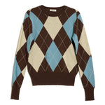 Wool argyle pullover styled as a cosy blue patterned jumper for winter  
