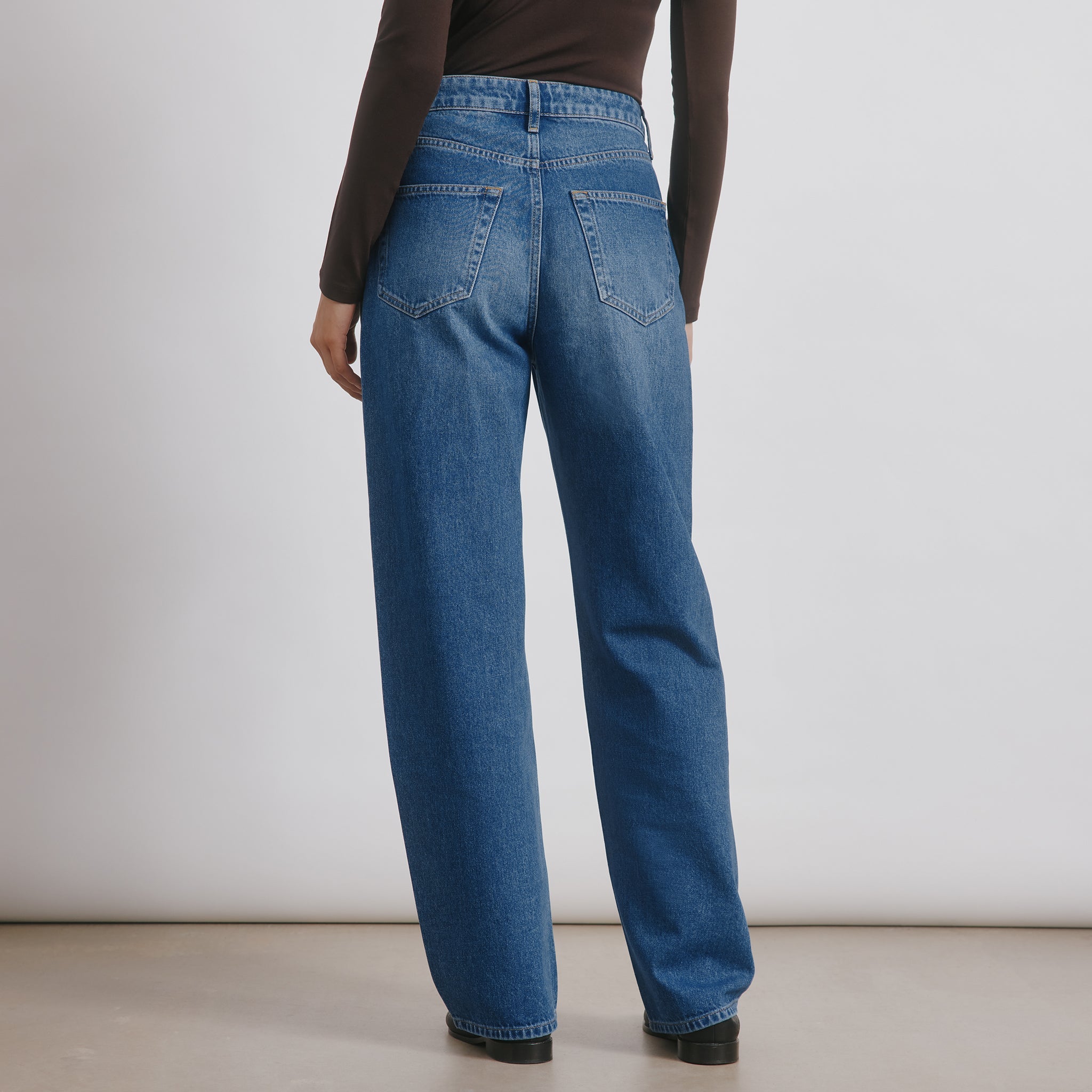 Classic straight jeans in mid rise fit with timeless straight leg cut  