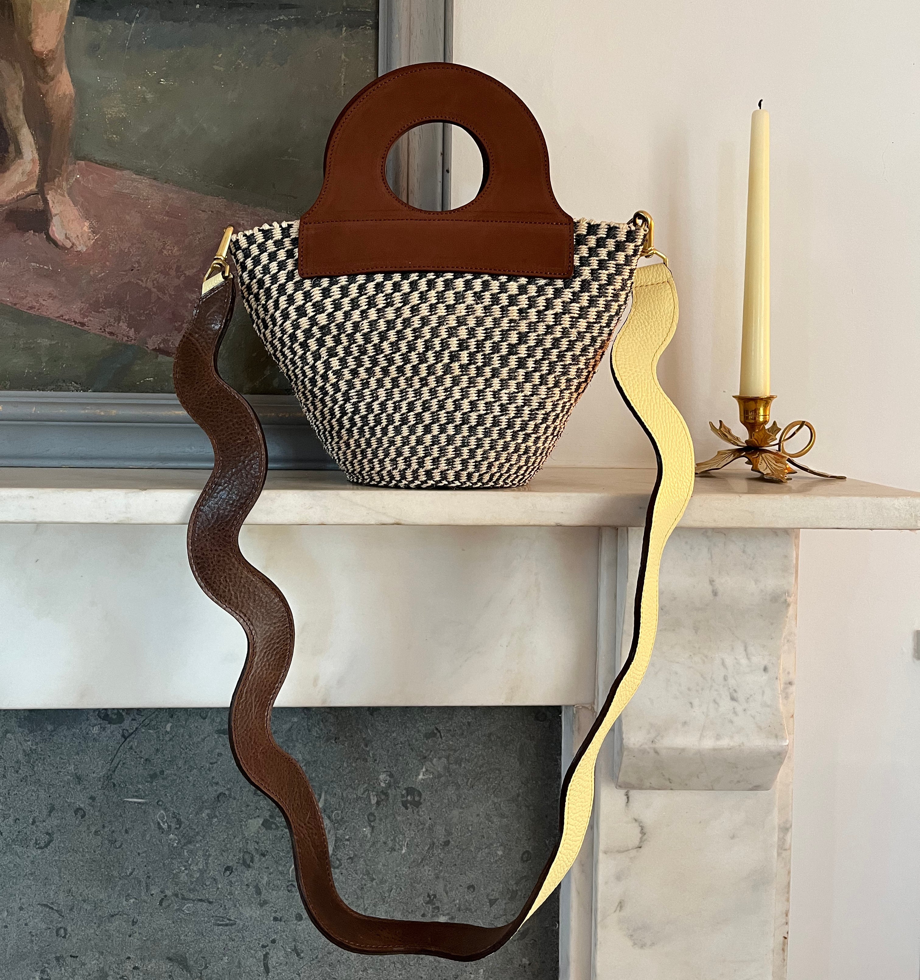 Brown suede basket bag with structured shape and upcycled leather trim.