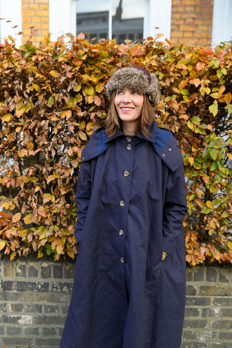 Waxed Cotton Asymmetric Raincoat in Navy by Lora Gene