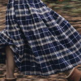 The Dune Pleated Midi Skirt in Navy Check