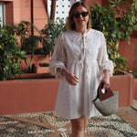 Stylish basket bag crafted from woven materials and upcycled leather.