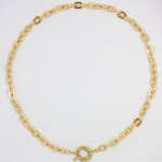 Close-up of gold plated chunky chain necklace highlighting the chunky front clasp.