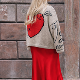 Slow Love Young Heart Jumper, flattering Red Satin Aldgate Skirt by Percy Langley. worn by journalist  Lauren Bravo