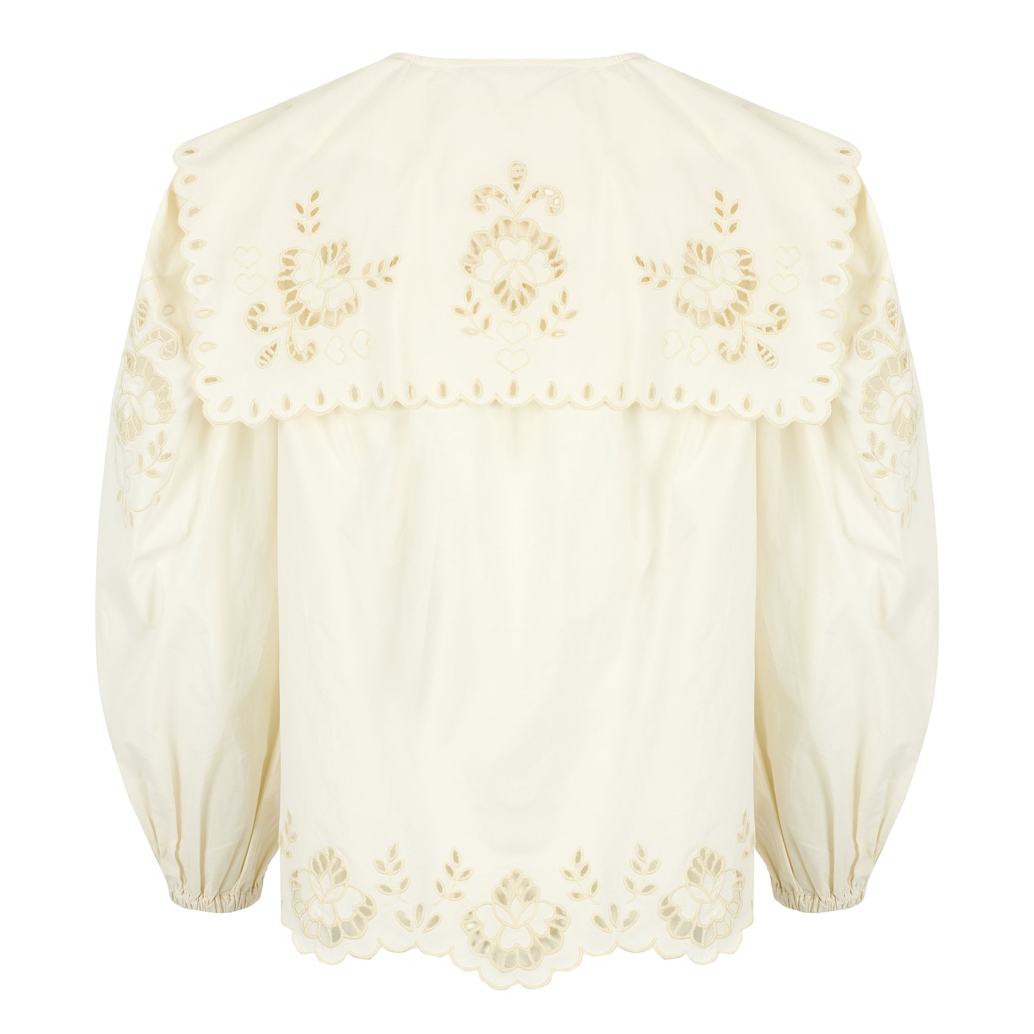 Elegant white blouse with long balloon sleeves, oversized collar, and embroidery along the cuffs.