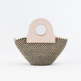 Basket bag in natural tones with black squiggle detail, upcycled leather basket bag