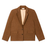 Oversized blazer in cinnamon tan on model, boxy blazer with single breasted closure and notch lapels, linen wool blazer styled as a smart casual blazer