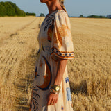 The Seraphina V-Neck Midi Dress in Celestial Print