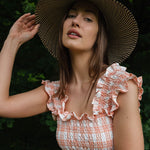 Lightweight cotton maxi summer dress with square neckline, shirred bodice, and delicate ruffle straps.