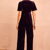 Anais Velvet V-Neck Jumpsuit in Aubergine