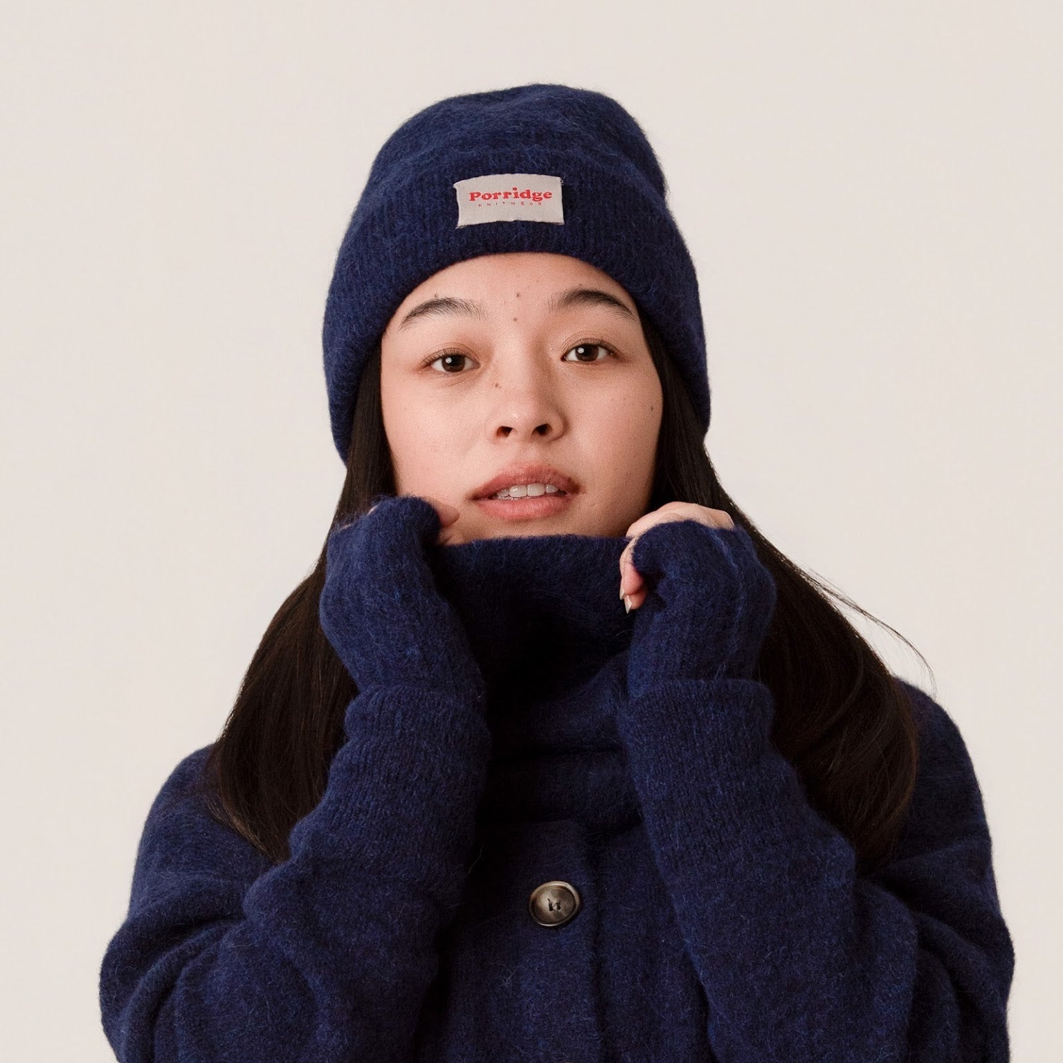 Fluffy inky blue beanie made from alpaca wool with a ribbed knit finish