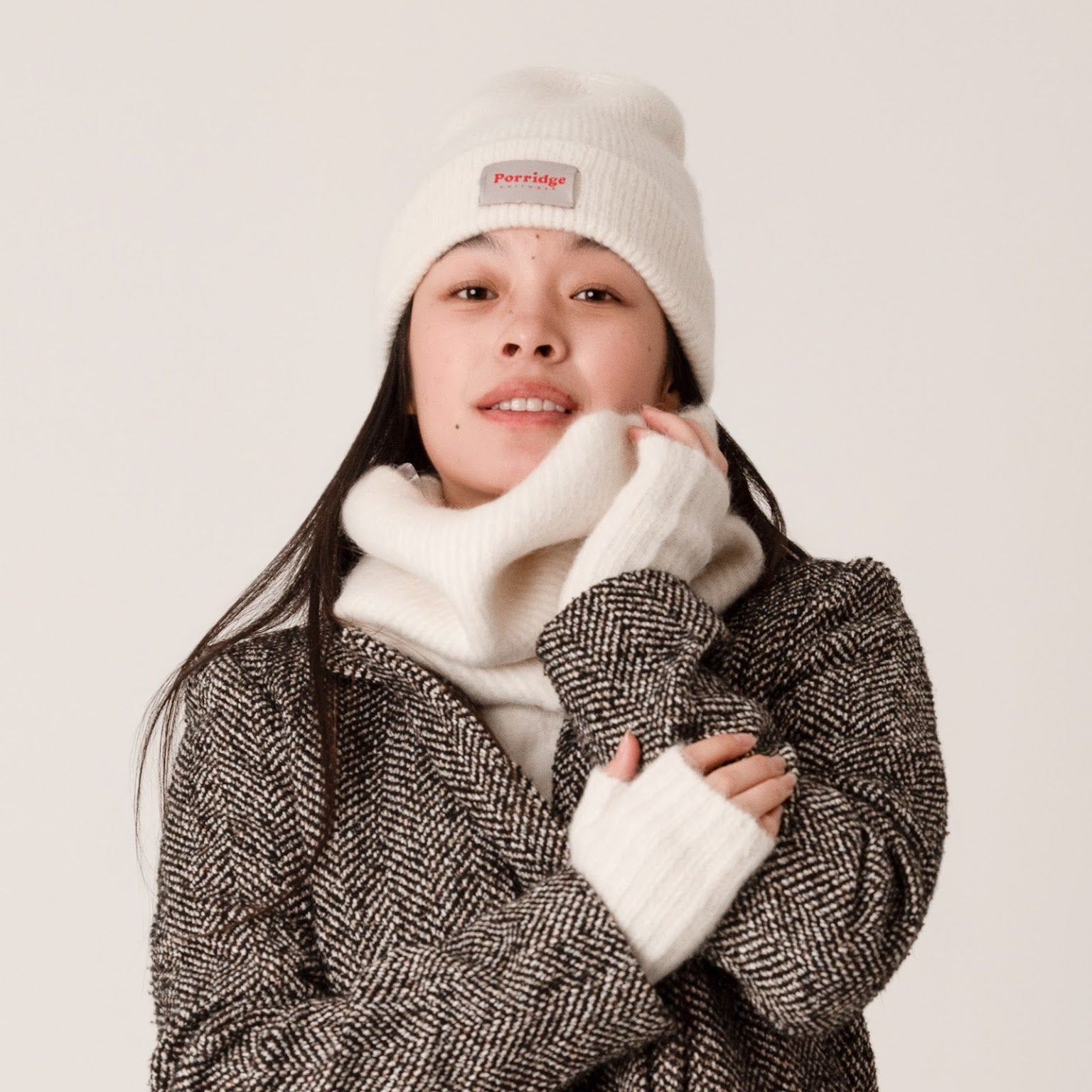 Cosy white rib knit wrist warmers made from alpaca wool