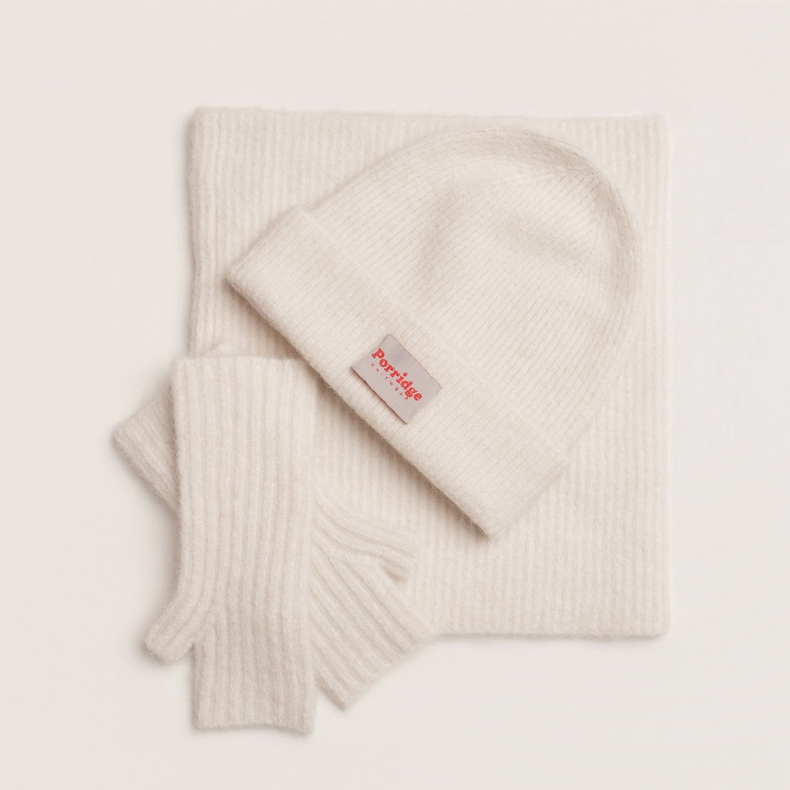 White alpaca snood styled as a fluffy neck warmer