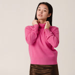 Soft pink fine knit turtleneck jumper in cropped wool cashmere blend