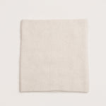 Soft rib knit alpaca snood in white showing cosy texture