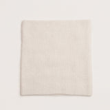 Soft rib knit alpaca snood in white showing cosy texture