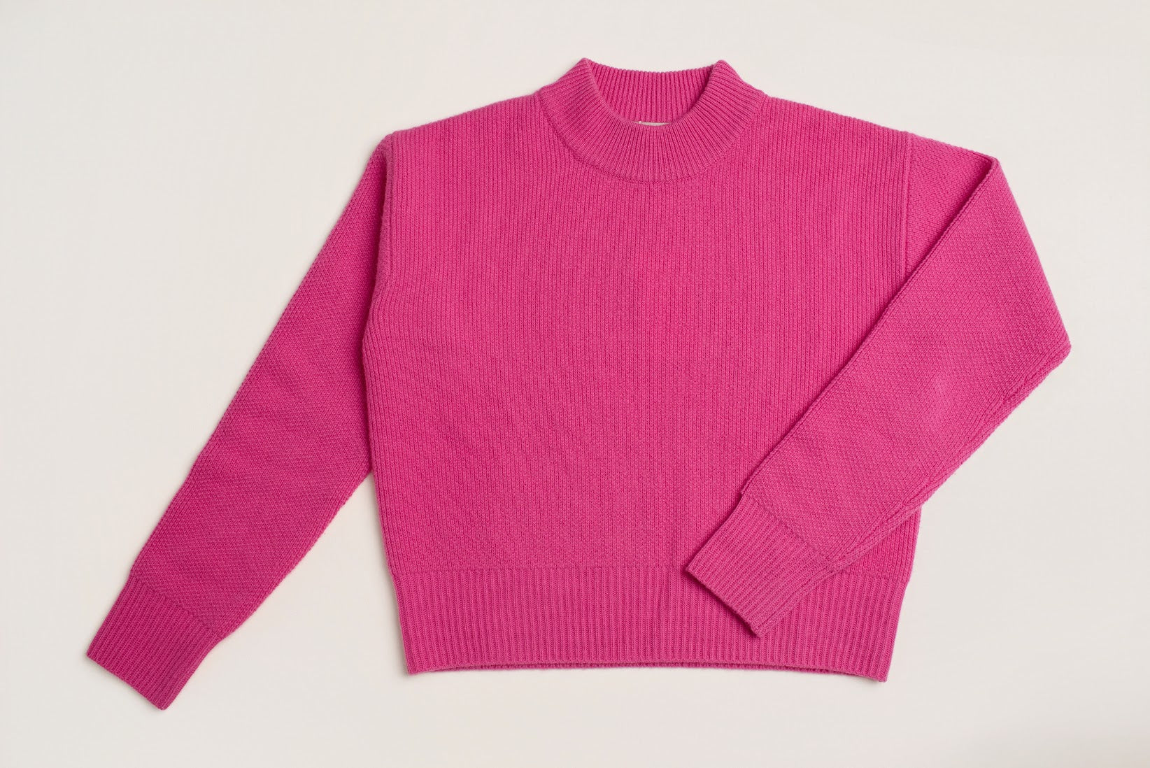 Peonie pink wool cashmere cropped jumper showing textured rib knit detail