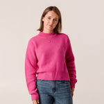 Soft pink cropped roll neck jumper in chunky rib knit wool cashmere blend