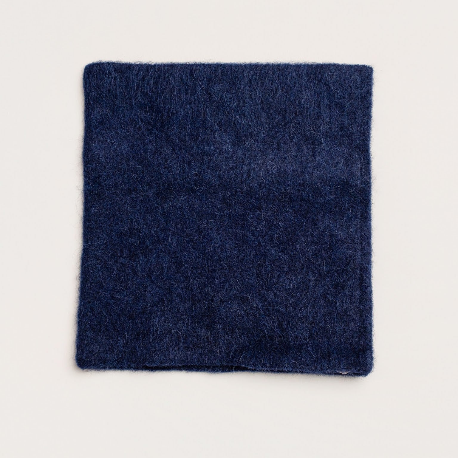 Alpaca wool snood in inky blue showing soft cosy texture