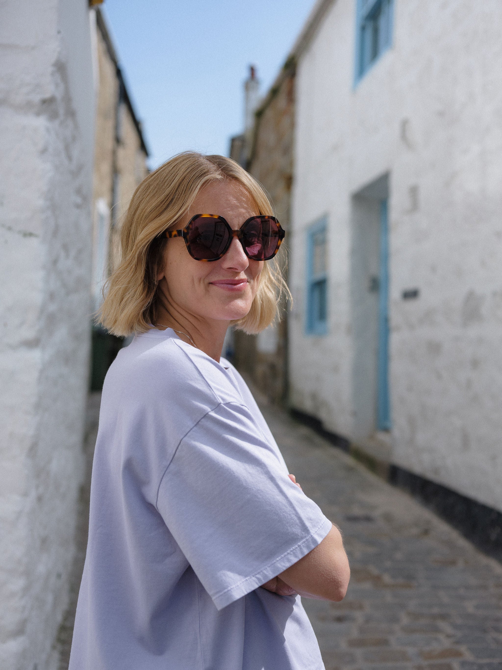Tortoise shell glasses with stylish rounded frames in classic tortoiseshell pattern.