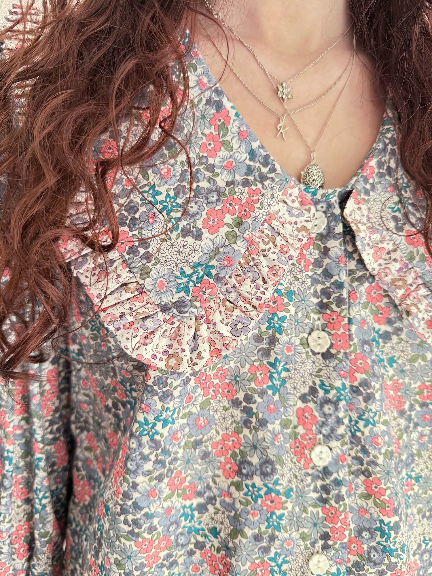 Ethical fashion – model styling handmade Luna Blouse with pink and blue floral prints