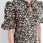 Deadstock floral cotton mini dress designed by The Well Worn for a bold, feminine look.