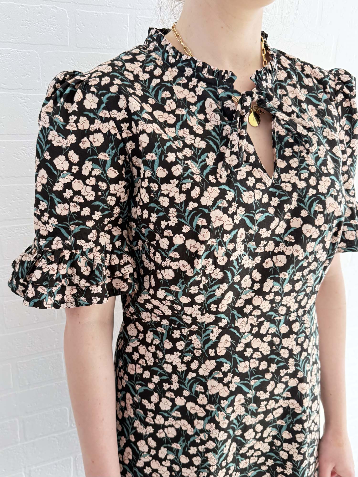 Deadstock floral cotton mini dress designed by The Well Worn for a bold, feminine look.