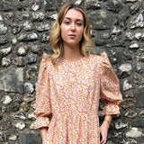 Close-up of The Grace Dress – Confetti Print midi dress with puff sleeves and elastic frill cuffs, handmade in the UK.