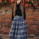 The Dune Pleated Midi Skirt in Navy Check