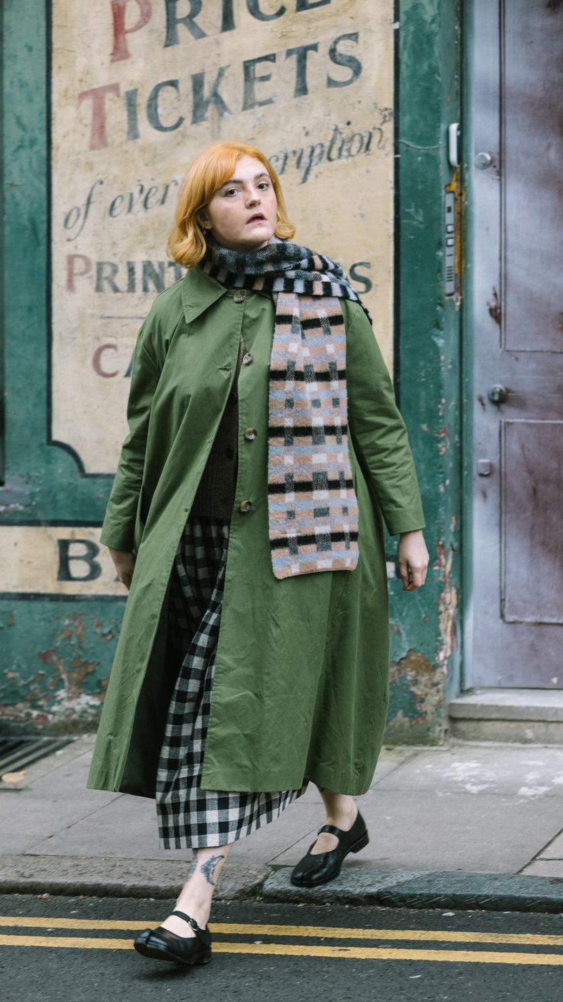 Waxed Cotton Asymmetric Raincoat in Olive by Lora Gene