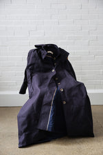 Waxed Cotton Asymmetric Raincoat in Navy by Lora Gene