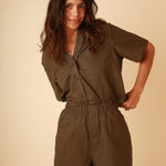 Casual two piece linen set with short sleeve shirt and high waisted shorts, perfect for summer.