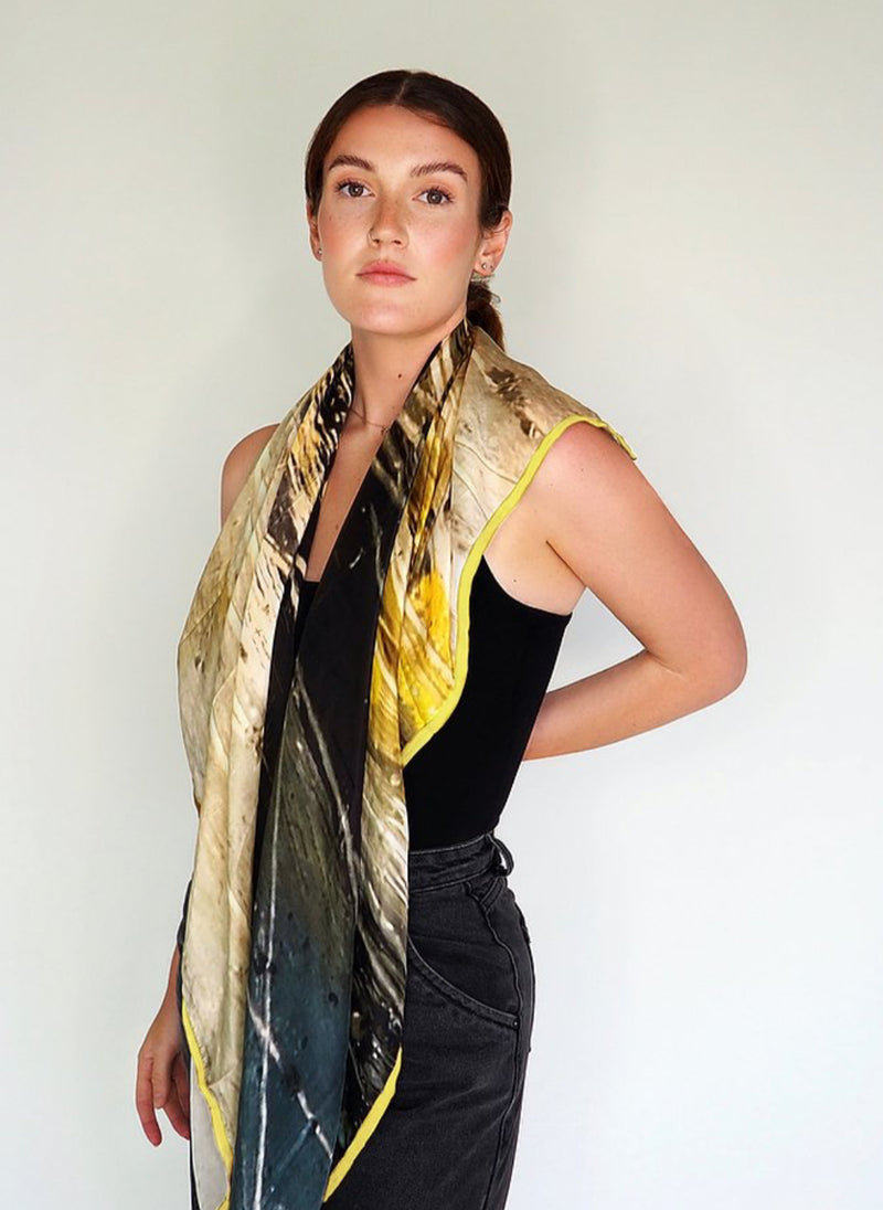 Large Moorland pure silk scarf - 130cm X 130cm.  Print taken from “Moorland” series of paintings onto gypsum; creating wonderfully abstract textures on a large scale. Trimmed with a lime silk chiffon edging for extra contrast.   Designers Rubykite hand wrap each item in a gorgeous silk pouch, not only beautiful to receive the pouch provides a great way to store your scarf. 
