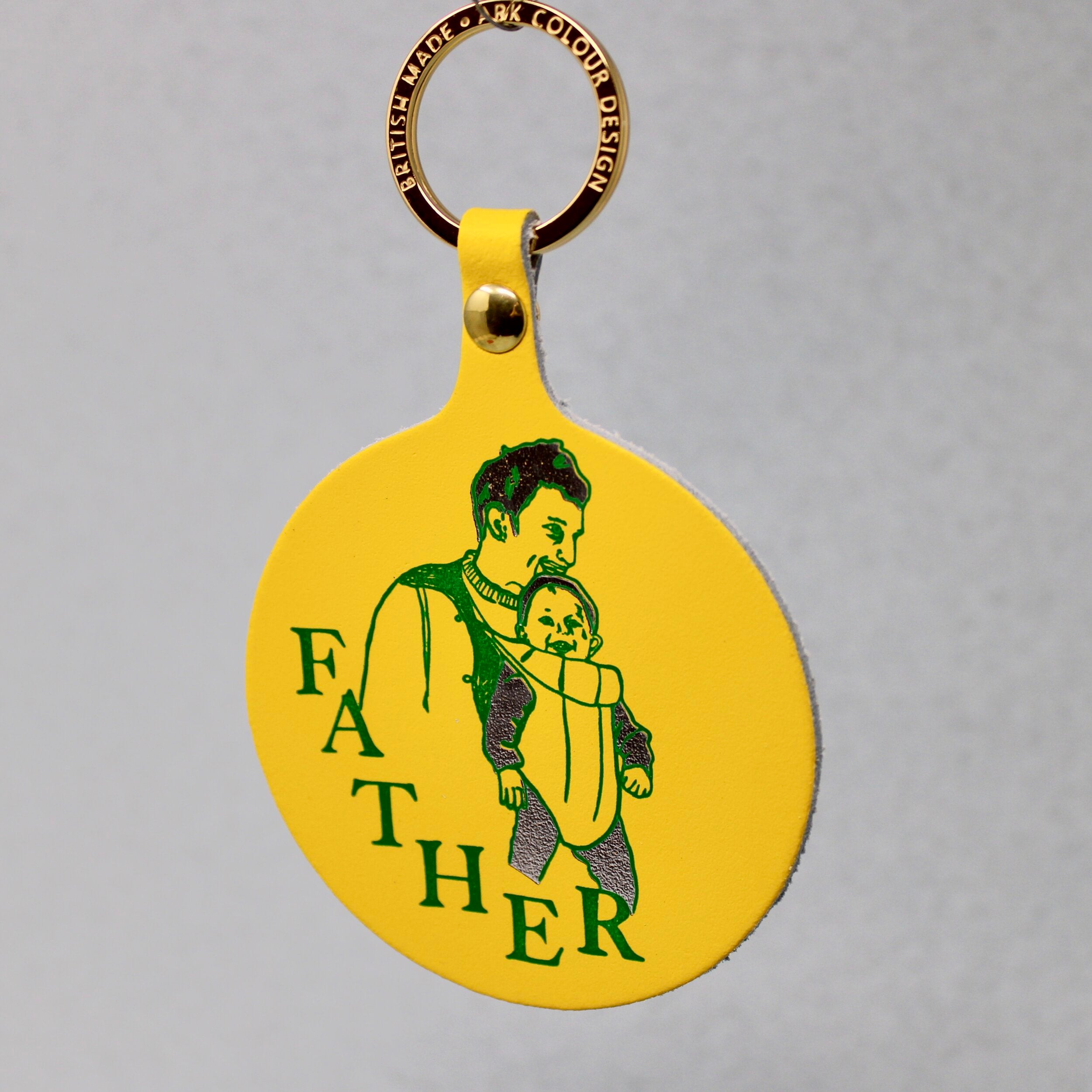 A lovely idea for a new father, a warm design for a key ring of a father and new born baby, sold by Percy Langley