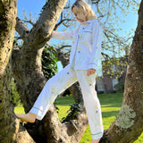 Fresh crisp white 100% Aegean cotton pyjamas with stand out prints for effortless style. Each print design is taken from a hand painted piece of art here in the UK, it’s then transformed into the striking fabric pattern on the highest quality 100% Aegean cotton. Long cotton fibres ensure strong durable soft cotton that actually improves with age.