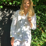Fresh crisp white 100% Aegean cotton pyjamas with stand out prints for effortless style. Each print design is taken from a hand painted piece of art here in the UK, it’s then transformed into the striking fabric pattern on the highest quality 100% Aegean cotton. Long cotton fibres ensure strong durable soft cotton that actually improves with age.