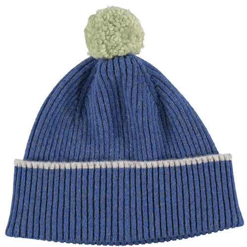100% Merino Lambswool Pom Pom Beanie in classic rib design, hand-finished with a folded brim with contrasting colour trim and pom pom. Unisex design. Expertly knitted in a traditional Scottish mill.